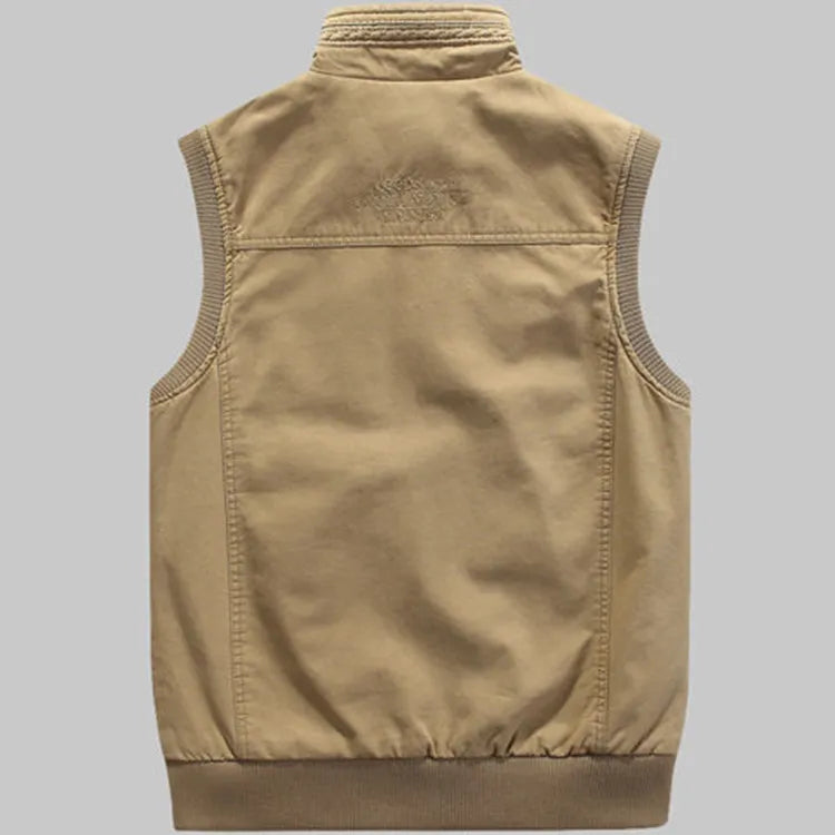 Veste homme tactique multipoches, style vintage robuste. Idéale pour l'aventure.