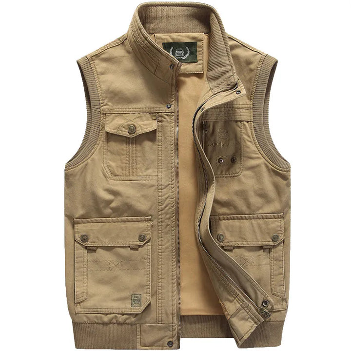 Veste homme tactique multipoches, style vintage robuste. Idéale pour l'aventure.