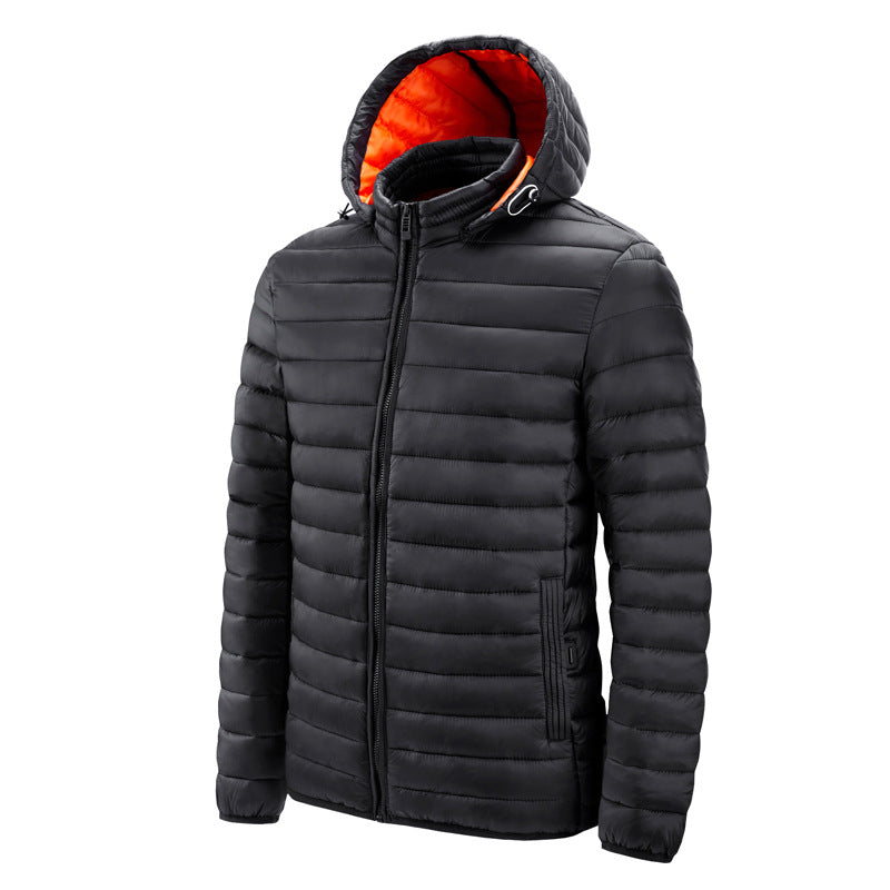 Homme portant la veste thermique matelassée Ivar en extérieur, chaude et confortable pour activités casual.