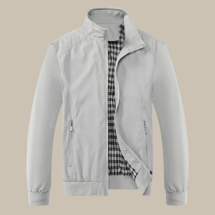 Veste légère homme été, coupe élégante et ajustée, tissu respirant bleu, idéale pour occasions casual ou semi-formelles.