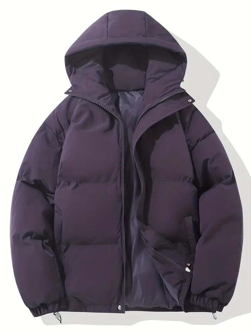Veste matelassée femme, design élégant, avec capuche, confort optimal pour l'automne.