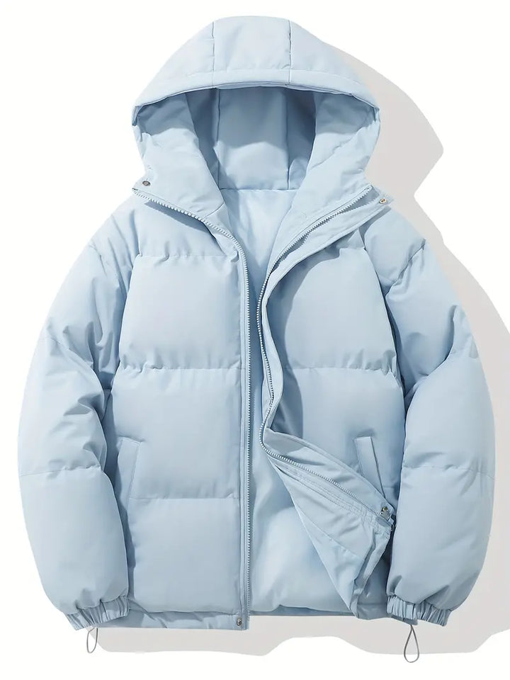 Blouson femme chaud matelassé avec capuche, indispensable pour l'hiver urbain.