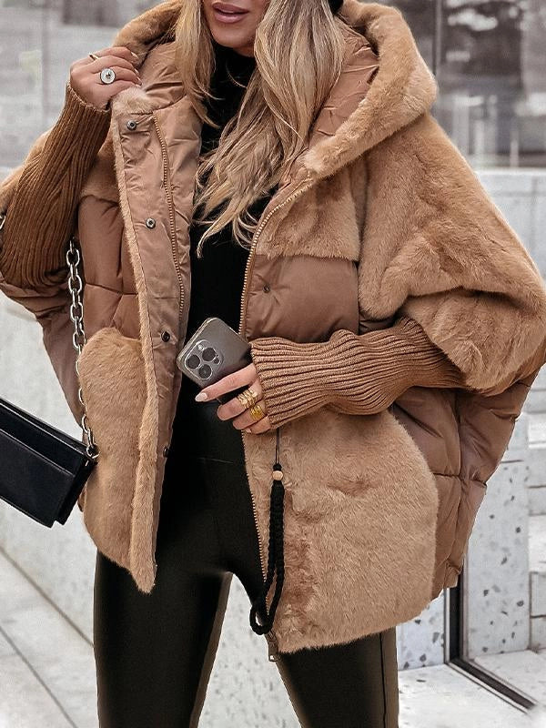 Veste matelassée moderne pour femme, alliant style et chaleur essentielle pour l'hiver.