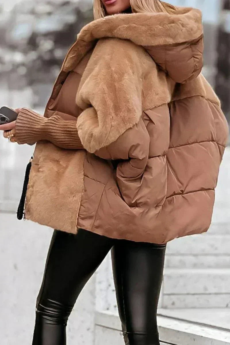 Veste chaude matelassée femme, parfaite pour affronter le froid de l'hiver avec style.