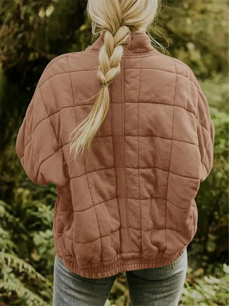 Veste matelassée, légère et respirante, parfaite pour les journées fraîches d'automne.
