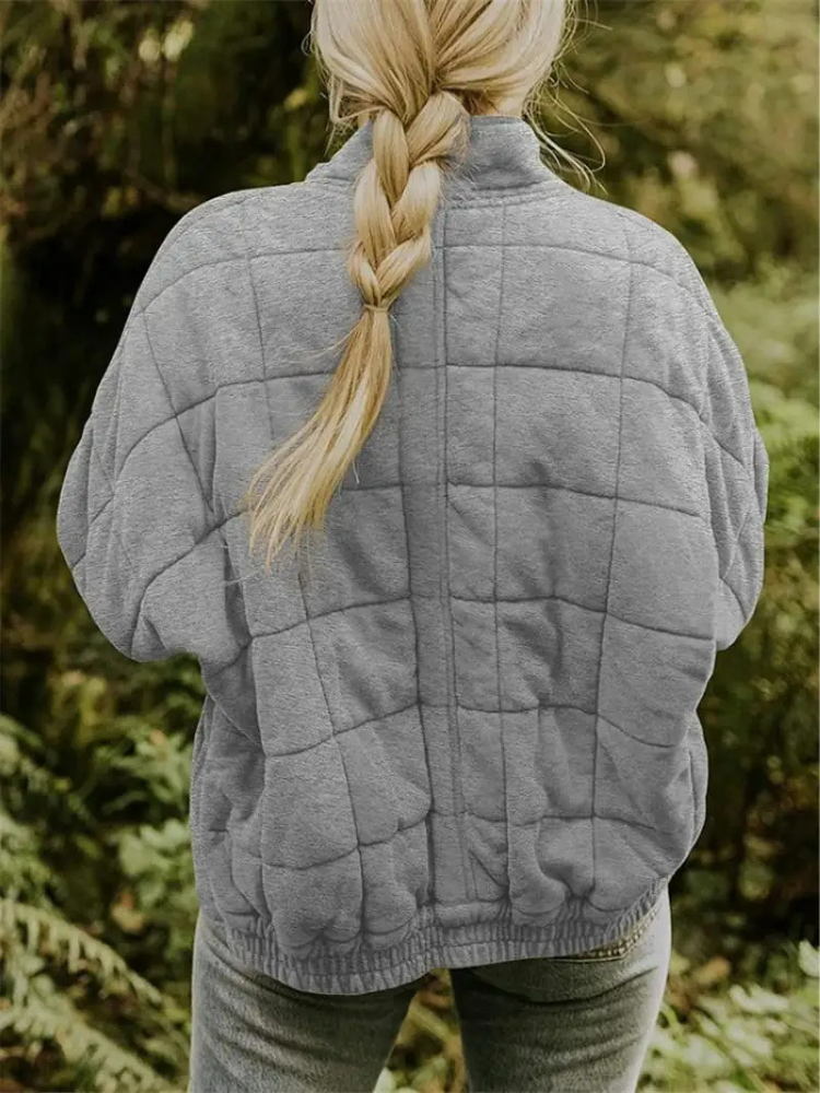 Veste matelassée femme, un incontournable pour un style chic et décontracté en automne.