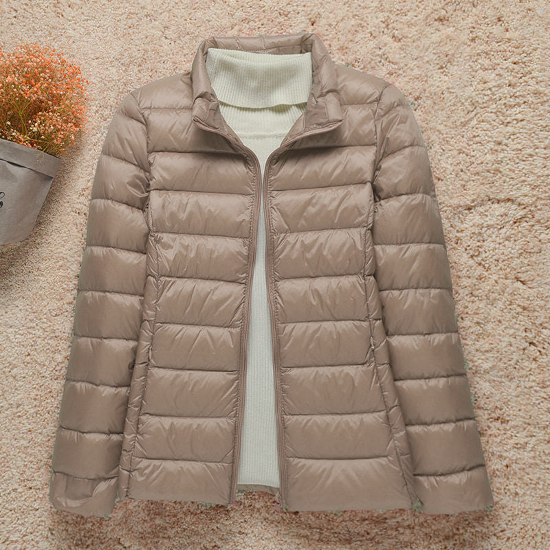 Veste matelassée femme polyvalente, style mode décontracté, parfaite pour automne, hiver et voyage.
