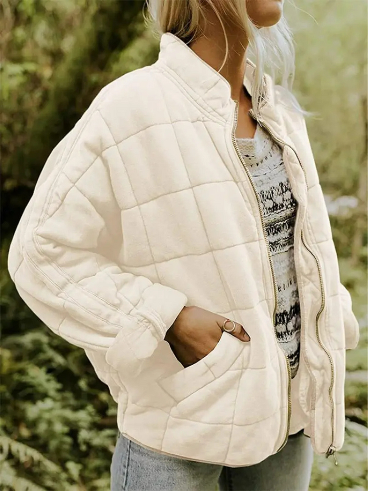 "Veste matelassée élégante pour femmes automne, coupe flatteuse, finition mate, couleurs variées."