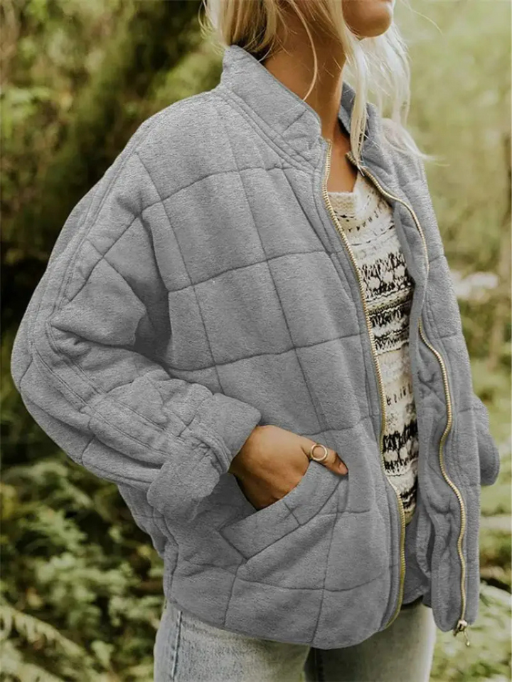 "Veste matelassée élégante pour femmes automne, coupe flatteuse, finition mate, couleurs variées."