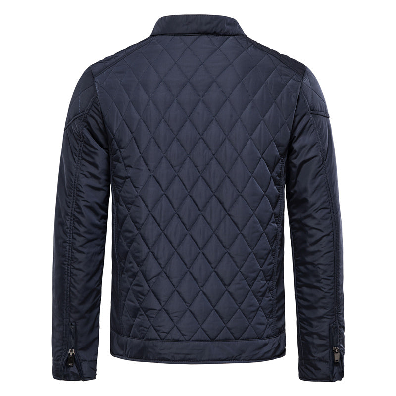 Veste matelassée homme bleu marine, coupe élégante et légère. Idéale pour l'automne.
