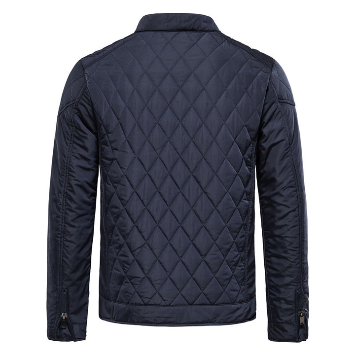 Veste matelassée homme bleu marine, coupe élégante et légère. Idéale pour l'automne.