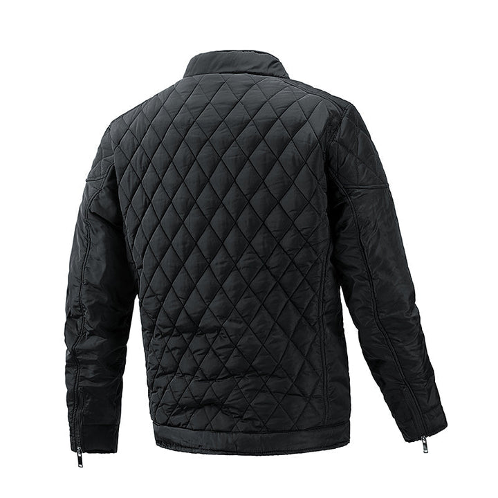Veste matelassée homme bleu marine, coupe élégante et légère. Idéale pour l'automne.