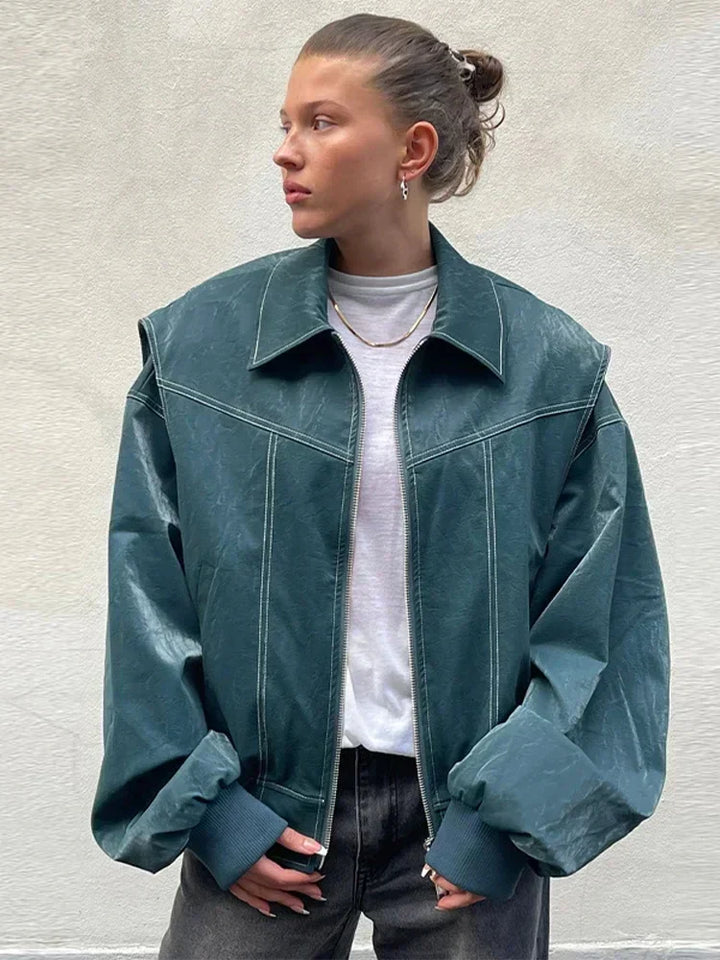 Veste mi-saison femme, coupe élégante, bleu-vert.  Modèle polyvalent, idéal printemps/automne.