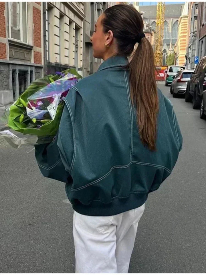 Veste mi-saison femme, coupe élégante, bleu-vert.  Modèle polyvalent, idéal printemps/automne.