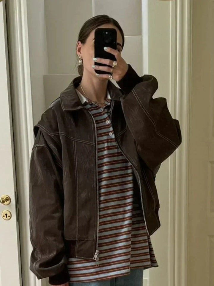 Veste mi-saison femme, coupe élégante, bleu-vert.  Modèle polyvalent, idéal printemps/automne.