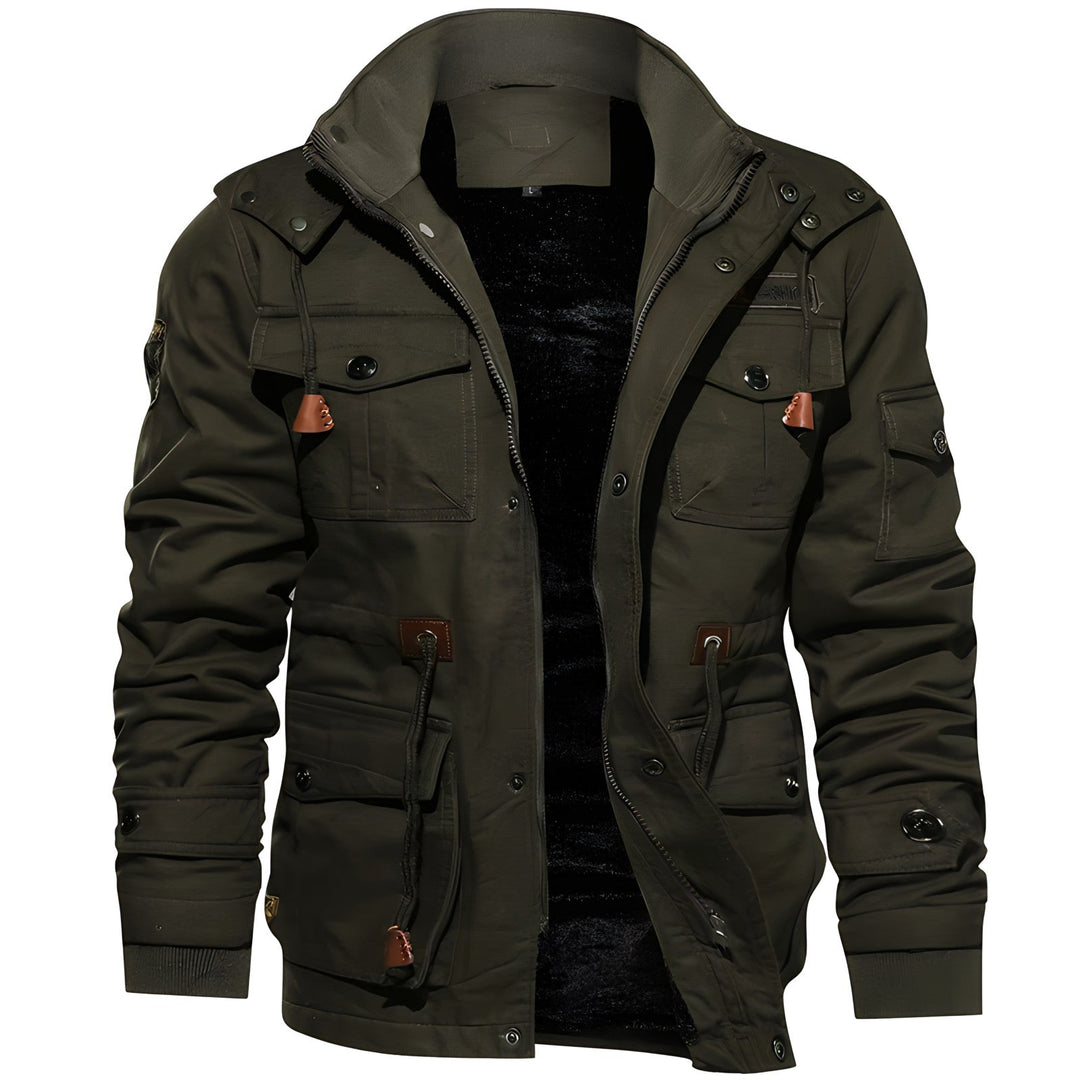 Veste militaire homme imperméable robuste, idéale pour l'automne et l'hiver en extérieur.
