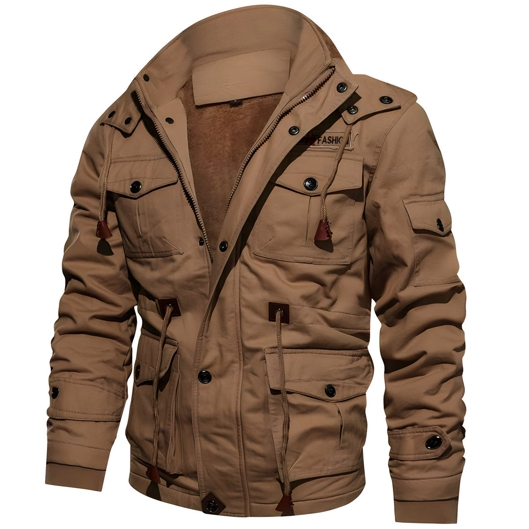 Veste homme militaire d'aventure, imperméable et coupe-vent pour explorations extérieures.