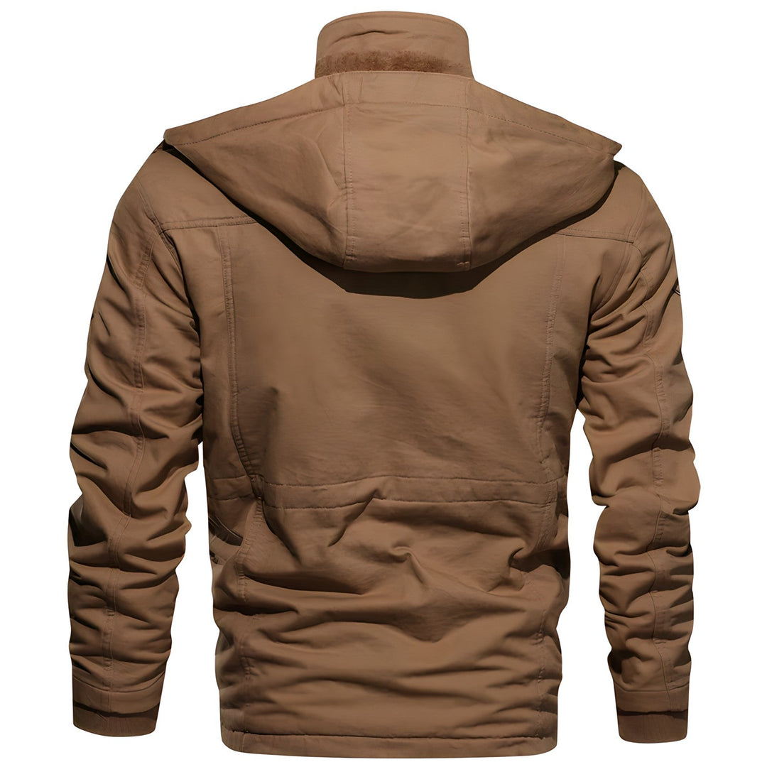 Veste robuste homme militaire, imperméable et résistante, idéale pour toutes conditions climatiques.