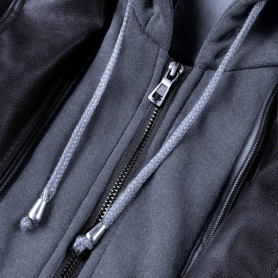 "Veste motard à capuche René, similicuir noir, coupe ajustée, protection intempéries, style urbain moderne."