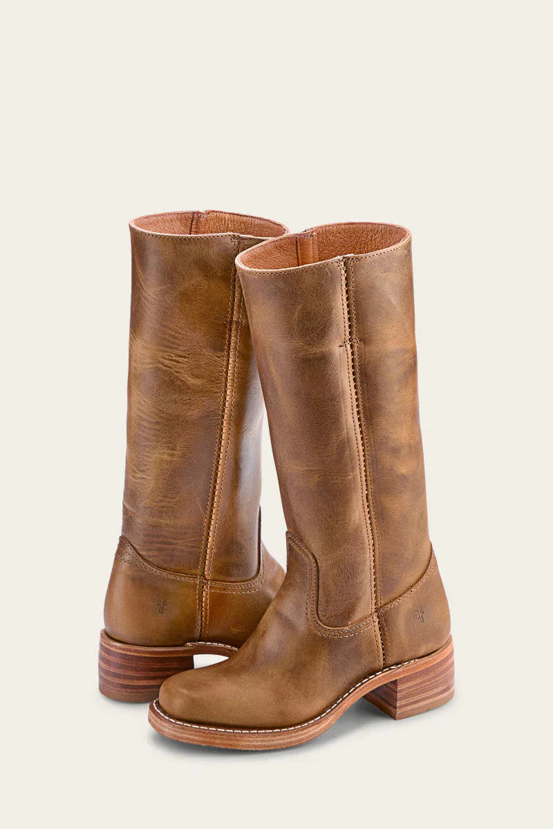 Bottes montantes femme structurées robustes, profil élégant et confort. Idéales pour l'hiver et l'automne.