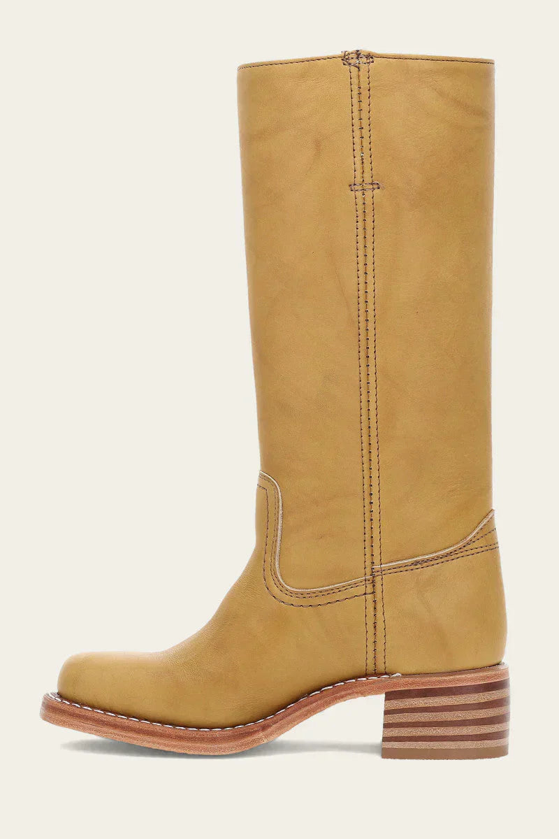 Bottes montantes femme structurées, style robuste et élégant. Chaussures parfaites pour l'automne-hiver.